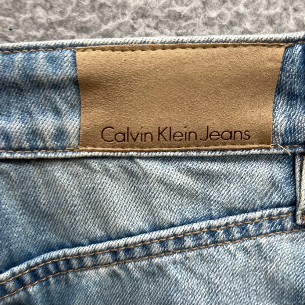 Calvin Klein denim mini skirt Size 30 w/pockets new w/tags distressed stone blue - Picture 12 of 14